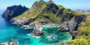 Travelers exploring the stunning coastline of Komodo Island.