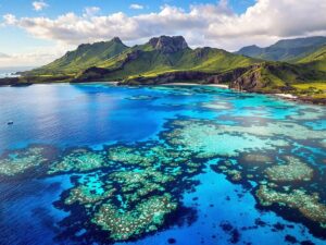 Komodo Island landscape with dragons and clear waters.